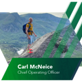 Chief Operating Officer, Carl McNeice on a mountain